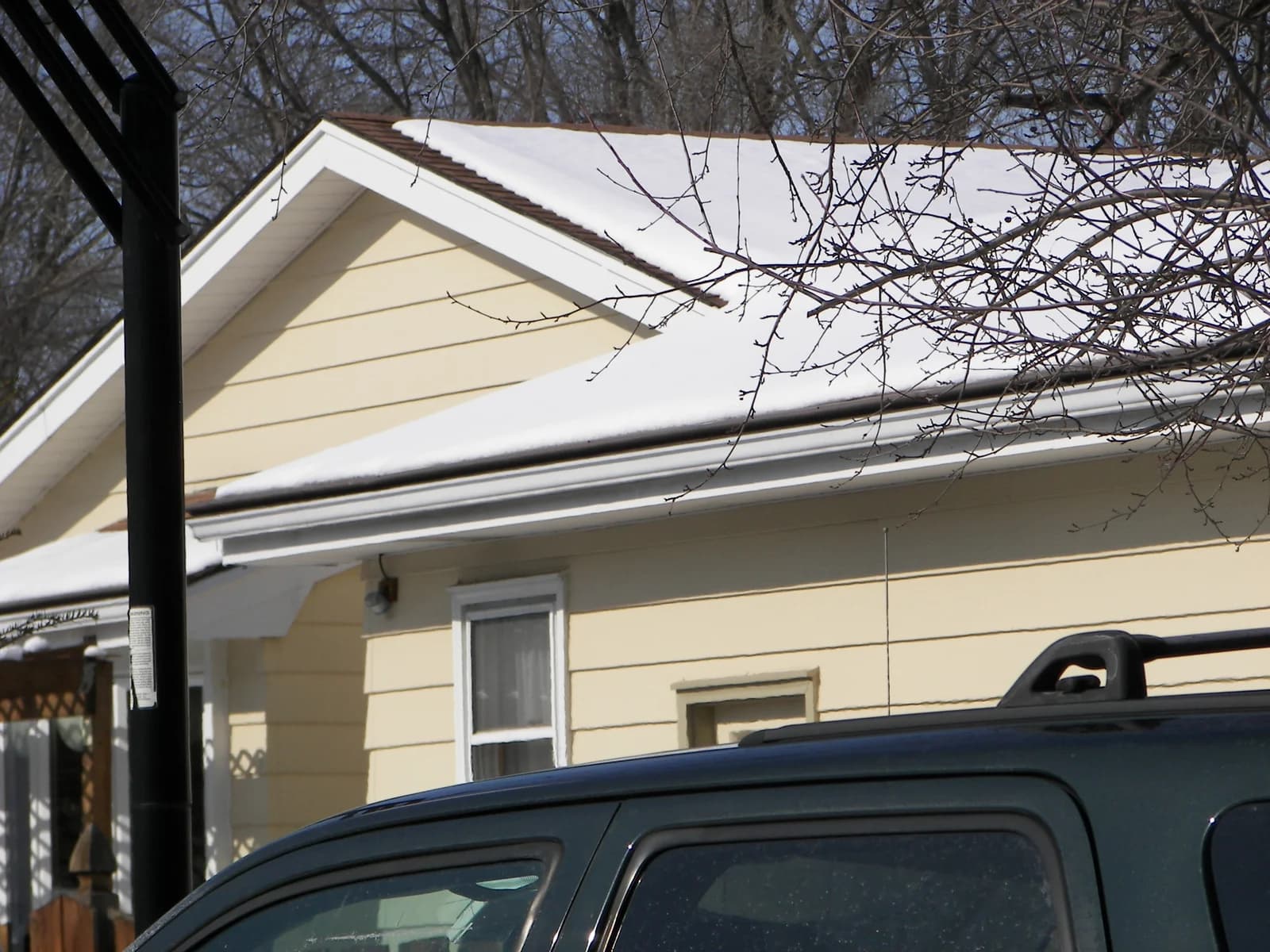 House with Turtle Shell Heater Cap gutter protection system