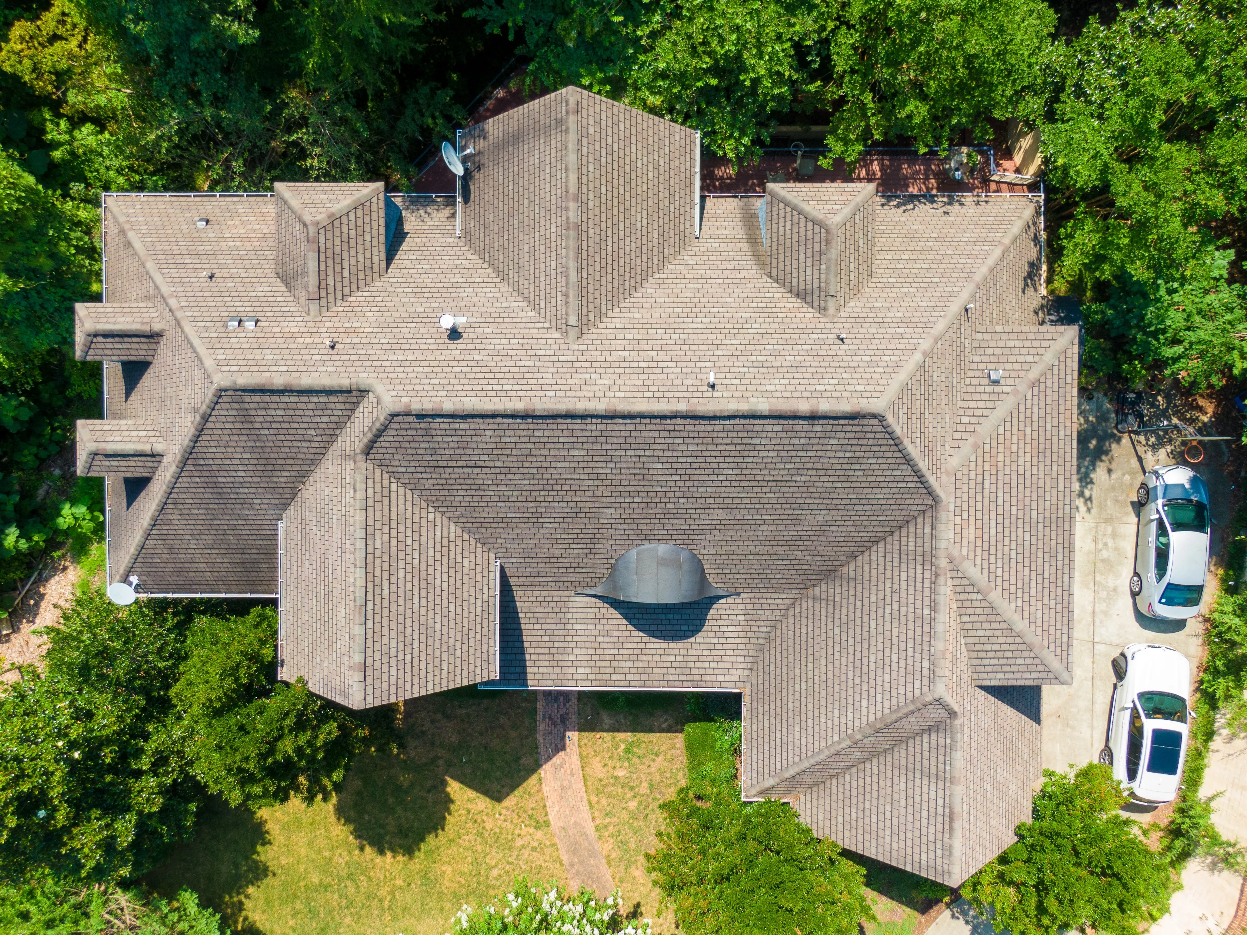 Premium asphalt shingle roof installed by Turtle Shell Home Protection
